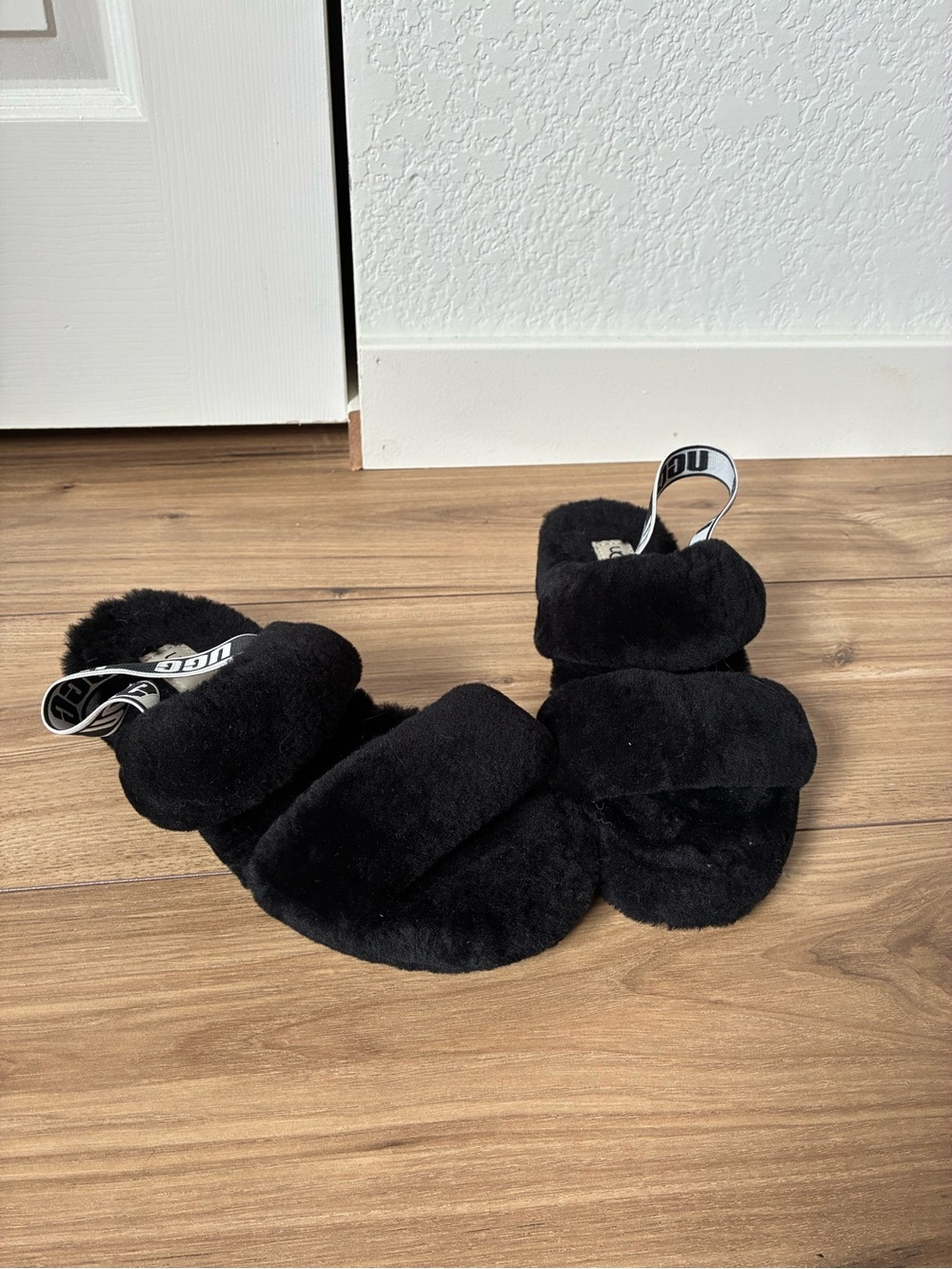 UGG Black Faux Fur Slide Sandal Slippers with Branded Heel Strap